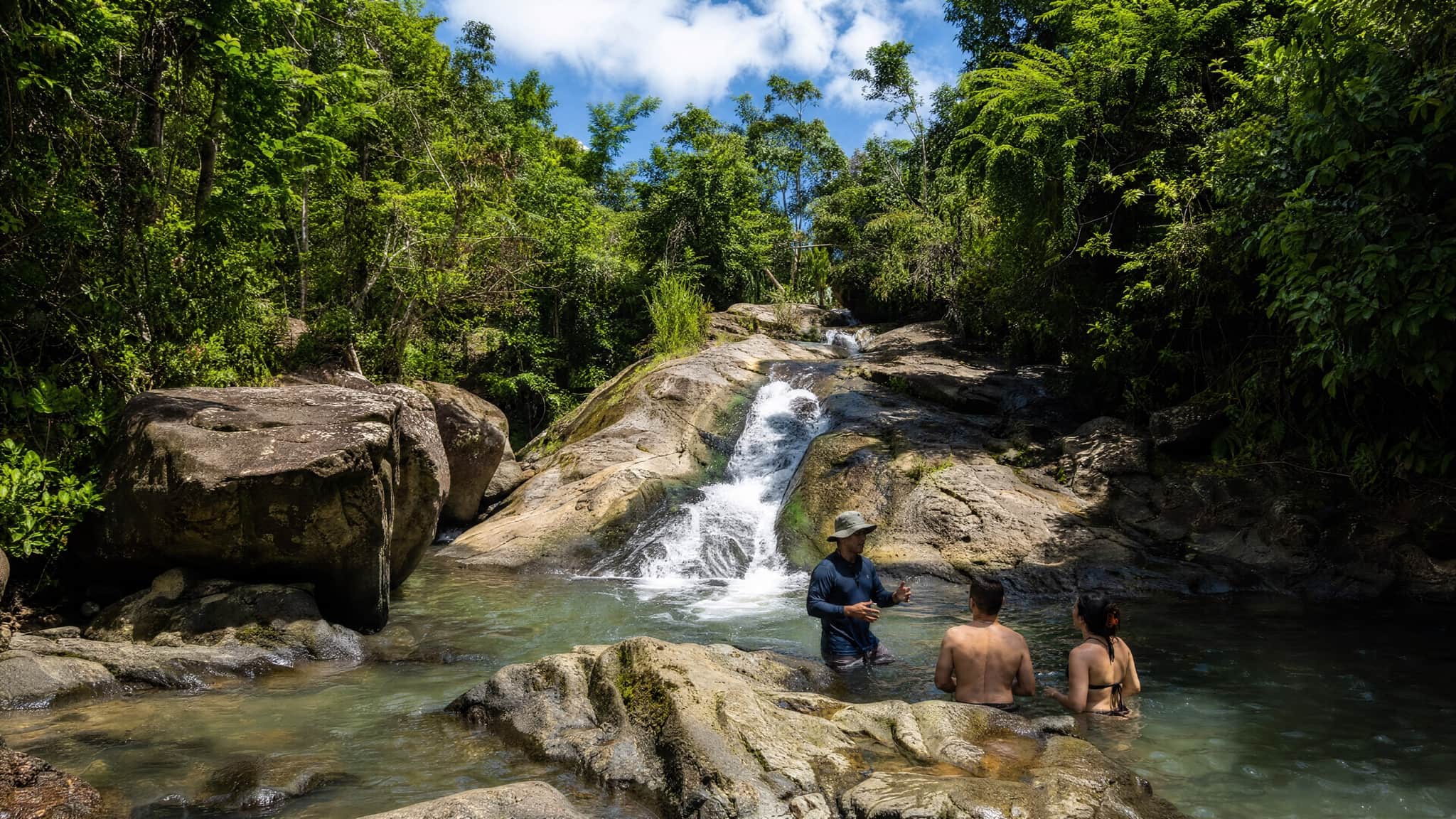 A waterfall and river pool deep in the El Yunque rainforest, Puerto Rico