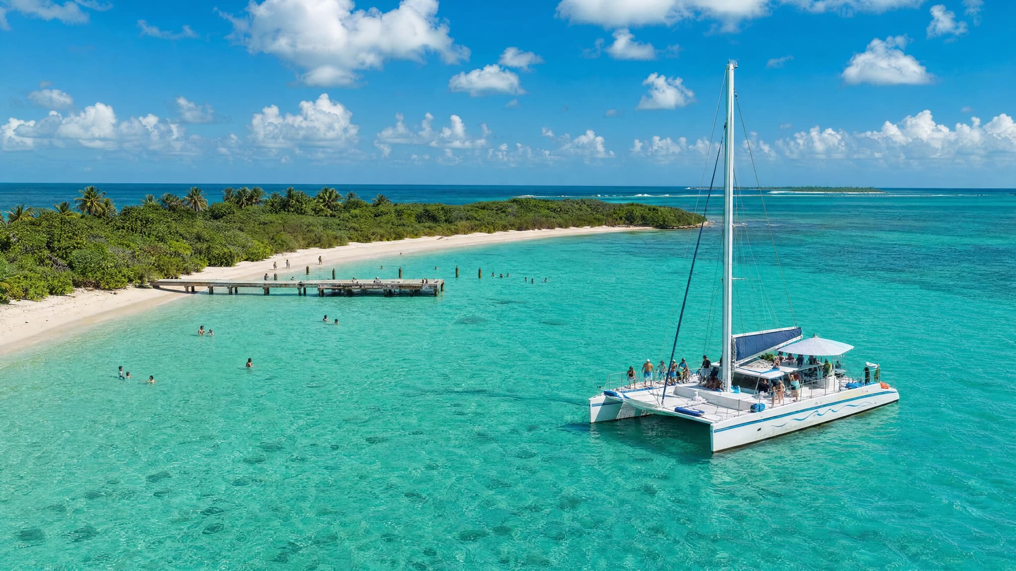 A catamaran anchored off the uninhabited island of Icacos near Fajardo